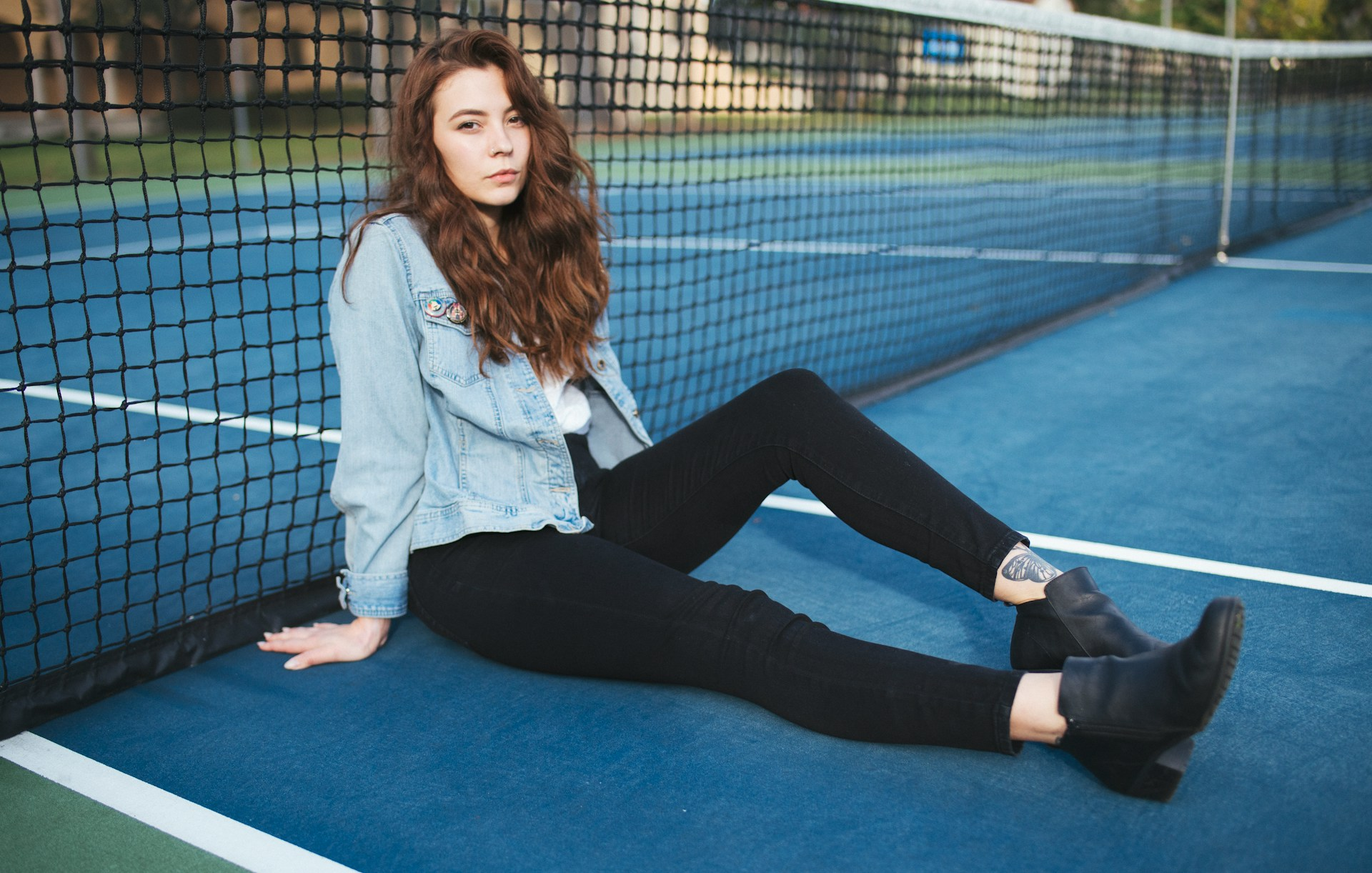 woman sitting on ground